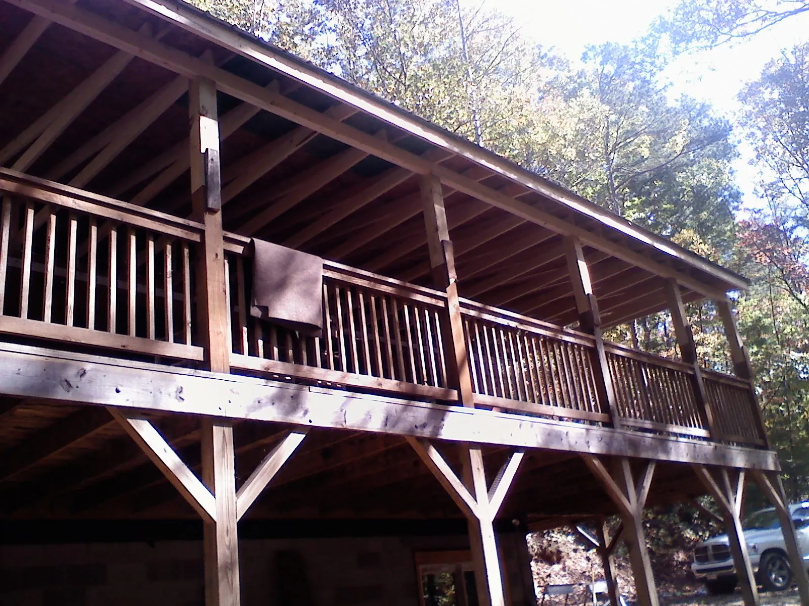 Timber framing under a new elevated porch and deck — Roof Leak Repair in Robeline by Roofing Brothers